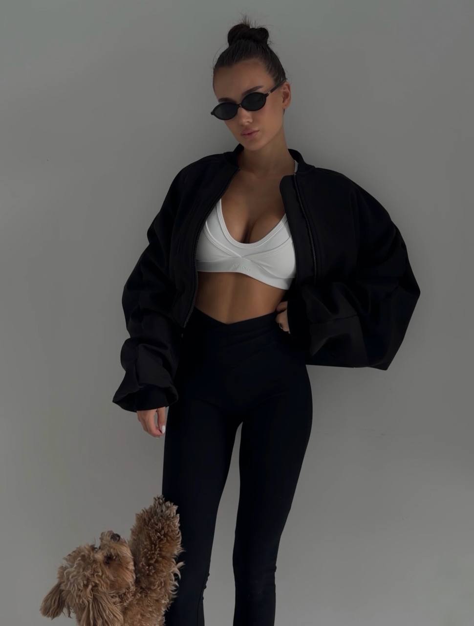 Black bomber jacket with voluminous sleeves